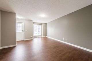 Photo 4: 1002 2445 Kingsland Road: Airdrie Row/Townhouse for sale : MLS®# A1177632