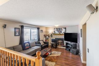 Photo 10: 118 Sanderling Road NW in Calgary: Sandstone Valley Detached for sale : MLS®# A1188396