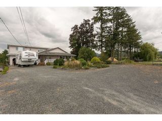 Photo 1: 34481 CLAYBURN Road in Abbotsford: Matsqui House for sale : MLS®# R2099514