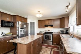Photo 10: 319 Mosselle Drive in Winnipeg: Amber Trails Residential for sale (4F)  : MLS®# 202215316