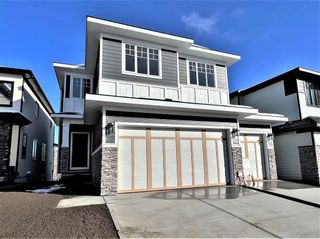 Photo 1: 93 Rock Lake Heights NW in Calgary: Rocky Ridge Detached for sale : MLS®# A1242202