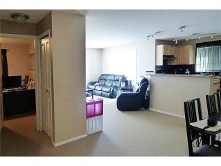 Photo 4: 2441 8 BRIDLECREST Drive SW in Calgary: Bridlewood Condo for sale : MLS®# C4084322