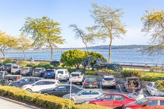 Main Photo: 111 14881 MARINE Drive: White Rock Condo for sale in "DRIFTWOOD ARMS" (South Surrey White Rock)  : MLS®# R2595780