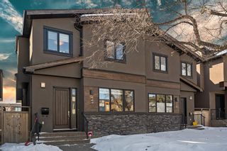 Photo 1: 447 28 Avenue NW in Calgary: Mount Pleasant Semi Detached (Half Duplex) for sale : MLS®# A2037817