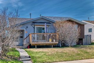 Photo 1: 59 Falchurch Road NE in Calgary: Falconridge Semi Detached (Half Duplex) for sale : MLS®# A2130839