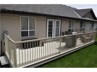Photo 17: 27 103 FAIRWAYS Drive NW: Airdrie Townhouse for sale : MLS®# C3524229