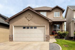 Photo 1: 341 EVERGLADE Circle SW in Calgary: Evergreen Detached for sale : MLS®# A1229284