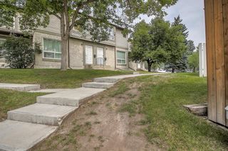 Photo 2: 142 Deer Ridge Lane SE in Calgary: Deer Ridge Row/Townhouse for sale : MLS®# A1186433