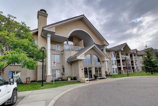 Photo 2: 123 728 Country Hills Road NW in Calgary: Country Hills Apartment for sale : MLS®# A1040222