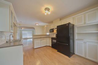 Photo 2: 214 21 Avenue NW in Calgary: Tuxedo Park Detached for sale : MLS®# A2127159