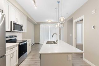 Photo 3: 103 25 Walgrove Walk SE in Calgary: Walden Apartment for sale : MLS®# A2115872