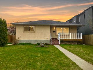 Photo 1: 3128 39 Street SW in Calgary: Glenbrook Detached for sale : MLS®# A2050070
