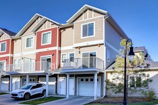 Photo 1: 16 Redstone Circle NE in Calgary: Redstone Row/Townhouse for sale : MLS®# A1215153