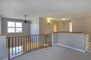 Photo 16: 145 TREMBLANT Place SW in Calgary: Springbank Hill Detached for sale : MLS®# A1024099