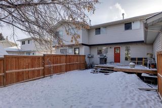 Photo 35: 322 Woodvale Crescent SW in Calgary: Woodlands Row/Townhouse for sale : MLS®# A2015272