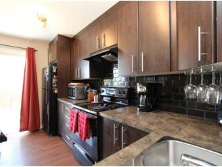 Photo 5: 602 2445 KINGSLAND Road SE: Airdrie Townhouse for sale : MLS®# C3624049