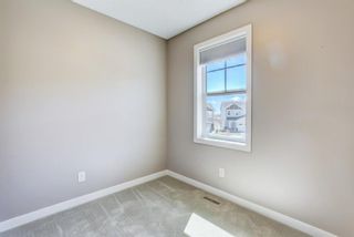 Photo 21: 105 881 Sage Valley Boulevard NW in Calgary: Sage Hill Row/Townhouse for sale : MLS®# A1214463
