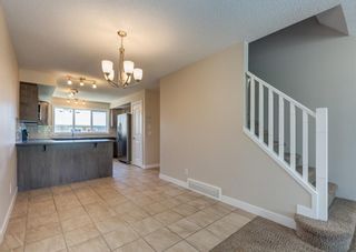 Photo 7: 59 Fireside Parkway: Cochrane Row/Townhouse for sale : MLS®# A2053037