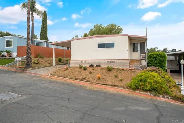 Main Photo: Manufactured Home for sale : 4 bedrooms : 2400 W Valley Parkway #35 in Escondido