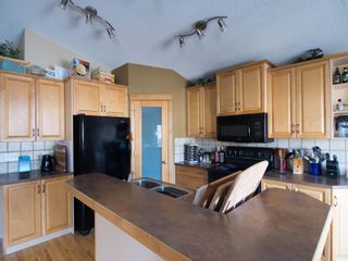 Photo 13: 101 Covehaven Gardens NE in Calgary: Coventry Hills Detached for sale : MLS®# A2033969