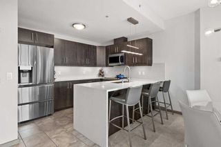 Main Photo: 2307 210 15 Avenue SE in Calgary: Beltline Apartment for sale : MLS®# A2083598