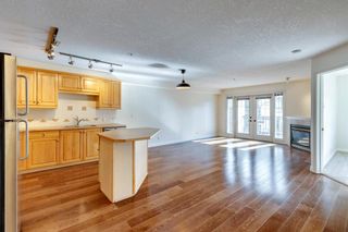 Photo 4: 209 630 10 Street NW in Calgary: Sunnyside Apartment for sale : MLS®# A2003864
