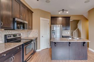 Photo 12: 320 Rainbow Falls Drive: Chestermere Row/Townhouse for sale : MLS®# A1114786