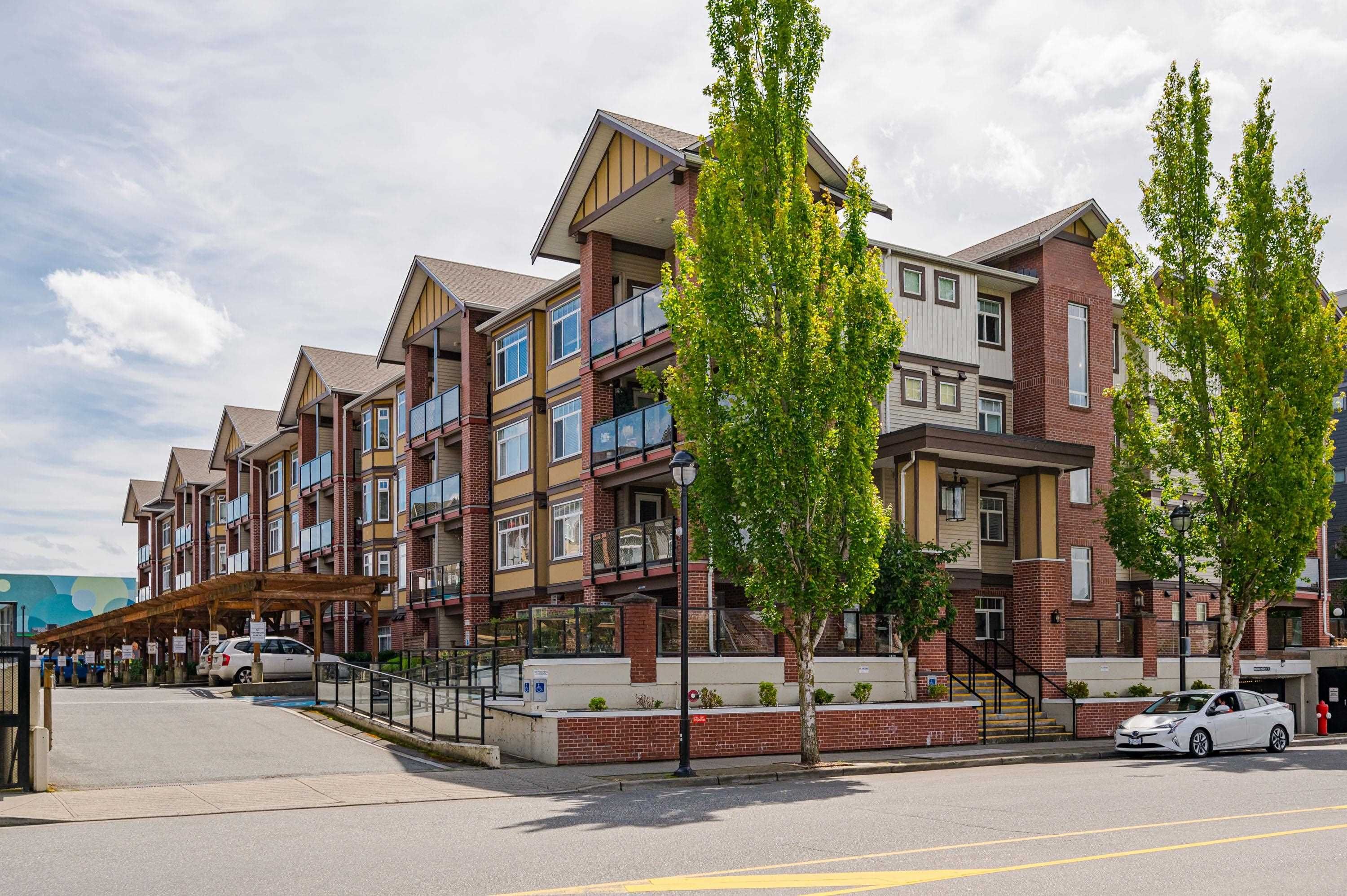 Photo 2: Photos: 420 5650 201A Street in Langley: Langley City Condo for sale in "Paddington Station" : MLS®# R2707221