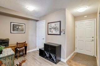 Photo 8: 1204 92 Crystal Shores Road: Okotoks Apartment for sale : MLS®# A1083634
