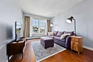 Photo 12: 410 201 Sunset Drive: Cochrane Apartment for sale : MLS®# A2032140
