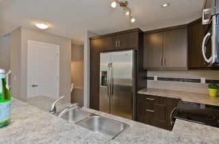 Photo 15: 3071 WINDSONG Boulevard SW: Airdrie Row/Townhouse for sale : MLS®# C4300138