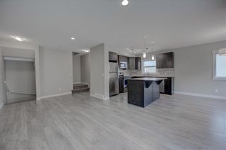 Photo 13: 405 Redstone View NE in Calgary: Redstone Row/Townhouse for sale : MLS®# A1224923