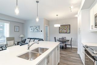 Photo 12: 211 100 Auburn Meadows Manor SE in Calgary: Auburn Bay Apartment for sale : MLS®# A1220075