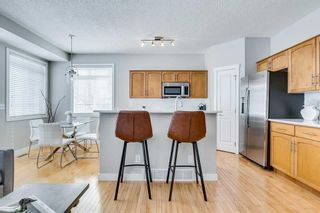 Photo 3: 92 Rockyspring Grove NW in Calgary: Rocky Ridge Semi Detached (Half Duplex) for sale : MLS®# A2118068