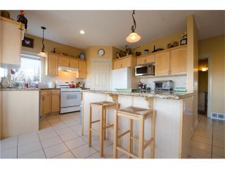 Photo 8: 76 STRATHLEA Place SW in Calgary: Strathcona Park House for sale : MLS®# C4092293