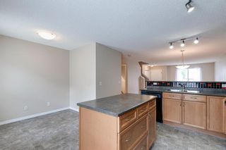 Photo 13: 208 Toscana Gardens NW in Calgary: Tuscany Row/Townhouse for sale : MLS®# A1127708