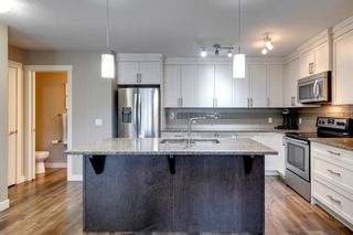 Photo 6: 306 Evanston Manor NW in Calgary: Evanston Row/Townhouse for sale : MLS®# A2019870