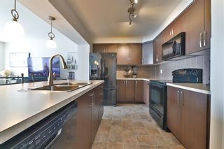 Photo 8: 104 Windstone Link SW: Airdrie Row/Townhouse for sale : MLS®# A1190179