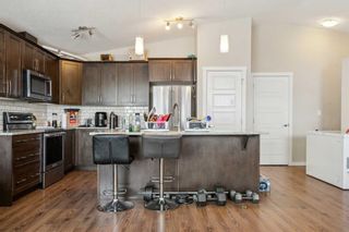 Photo 7: 322 2400 Ravenswood View SE: Airdrie Row/Townhouse for sale : MLS®# A2134463