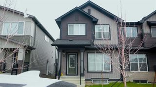 Photo 1: 12 Carringsby Manor NW in Calgary: Carrington Semi Detached (Half Duplex) for sale : MLS®# A2129064