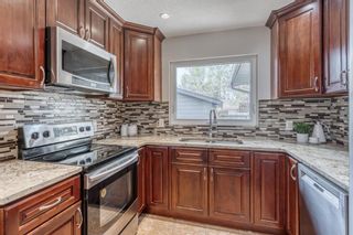 Photo 11: 735 Cantrell Drive SW in Calgary: Canyon Meadows Detached for sale : MLS®# A1240119
