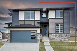 Photo 1: 410 Sundown Road: Cochrane Semi Detached (Half Duplex) for sale : MLS®# A2040874