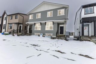 Photo 3: 220 Hotchkiss Drive in Calgary: C-385 Semi Detached (Half Duplex) for sale : MLS®# A2127862