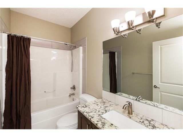 Photo 18: Photos: 110 Channelside Common SW: Airdrie House for sale : MLS®# C4085292