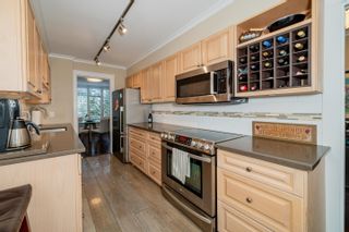 Photo 12: 402 1420 DUCHESS Avenue in West Vancouver: Ambleside Condo for sale in "The Westerlies" : MLS®# R2857880