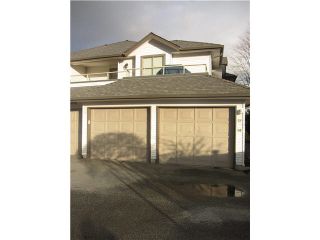 Photo 1: 51 19160 119TH Avenue in Pitt Meadows: Central Meadows Townhouse for sale in "WINDSOR OAK" : MLS®# V1100453