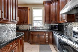 Photo 17: 41 Cougar Plateau Point SW in Calgary: Cougar Ridge Detached for sale : MLS®# A2087401