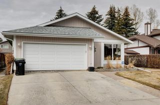 Photo 1: 80 Woodfield Crescent SW in Calgary: Woodbine Detached for sale : MLS®# A2042416