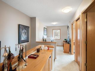 Photo 32: 82 Patina Rise SW in Calgary: Patterson Row/Townhouse for sale : MLS®# A1234186
