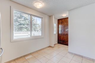 Photo 3: 199 Woodmont Terrace SW in Calgary: Woodbine Row/Townhouse for sale : MLS®# A1229565